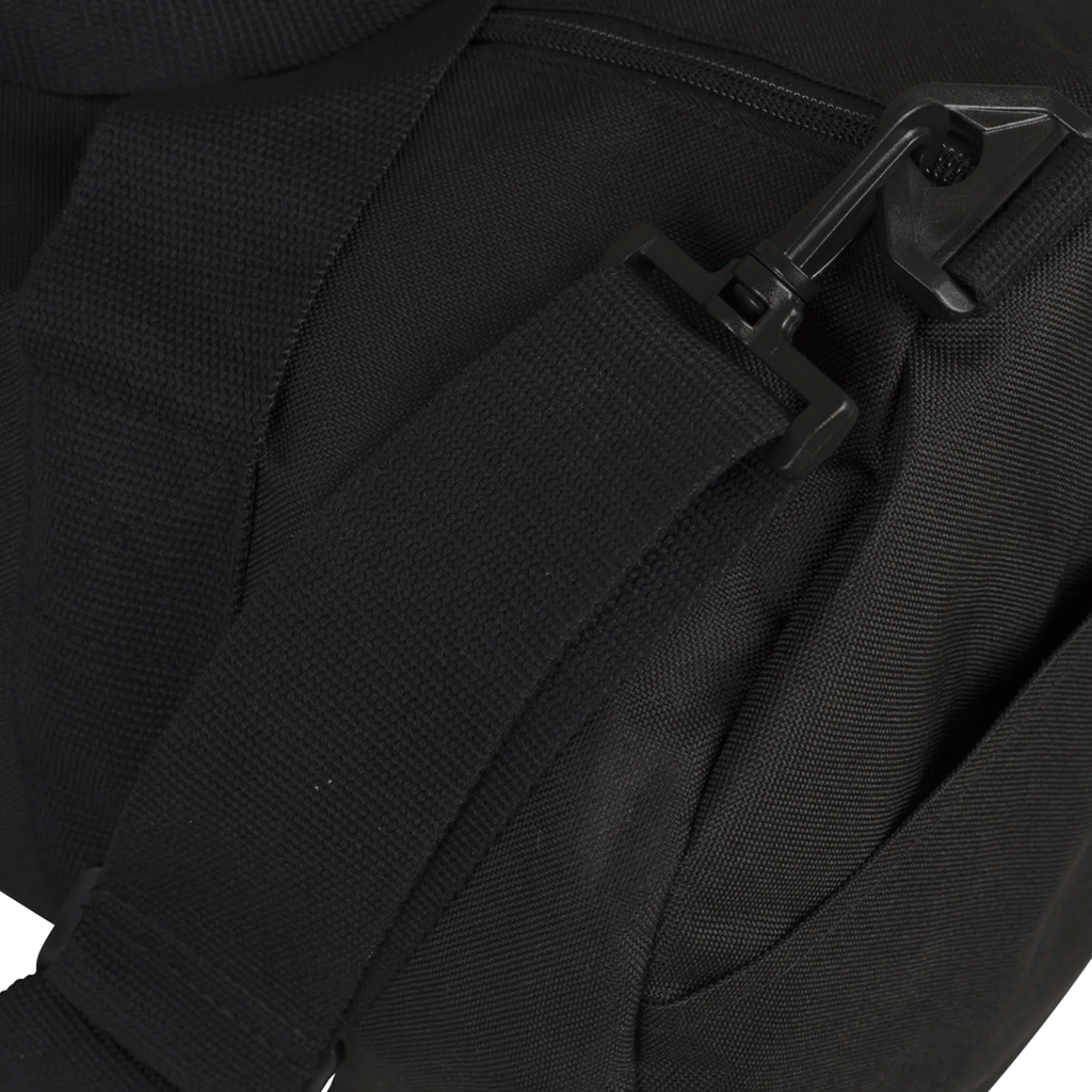 Close-up of a black backpack with straps on a white background