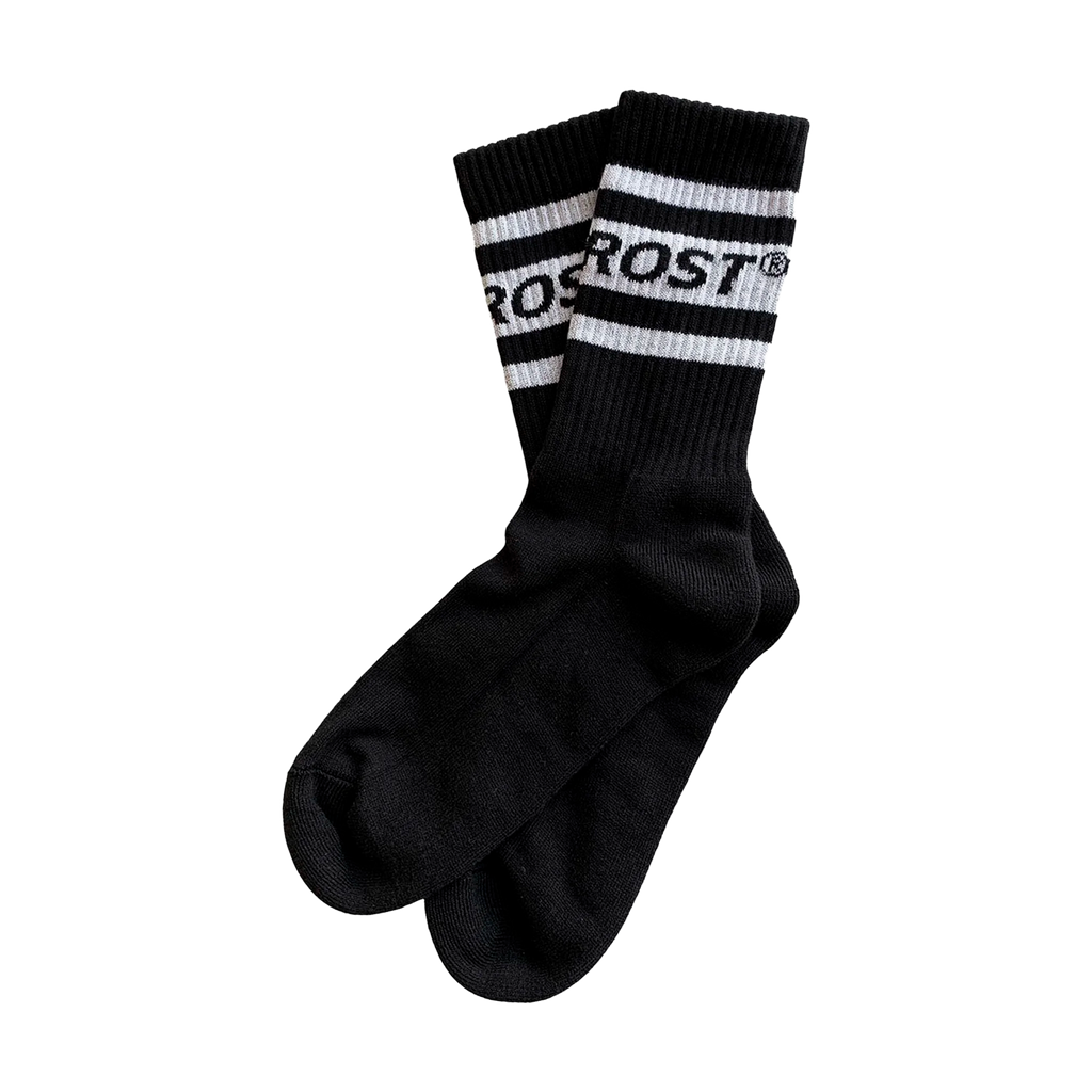 Black socks with white stripes and 'Rost' branding on a white background