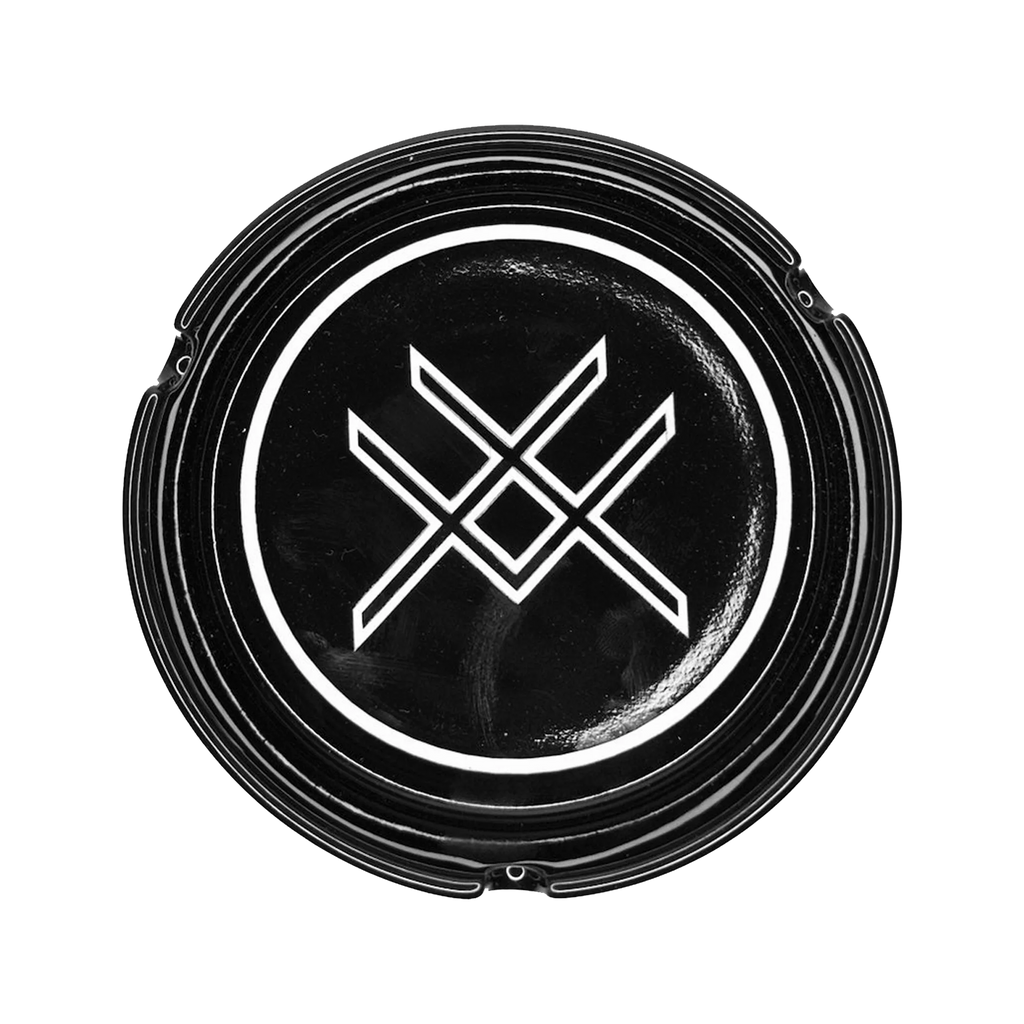 Black circular ashtray with a white logo on a white background