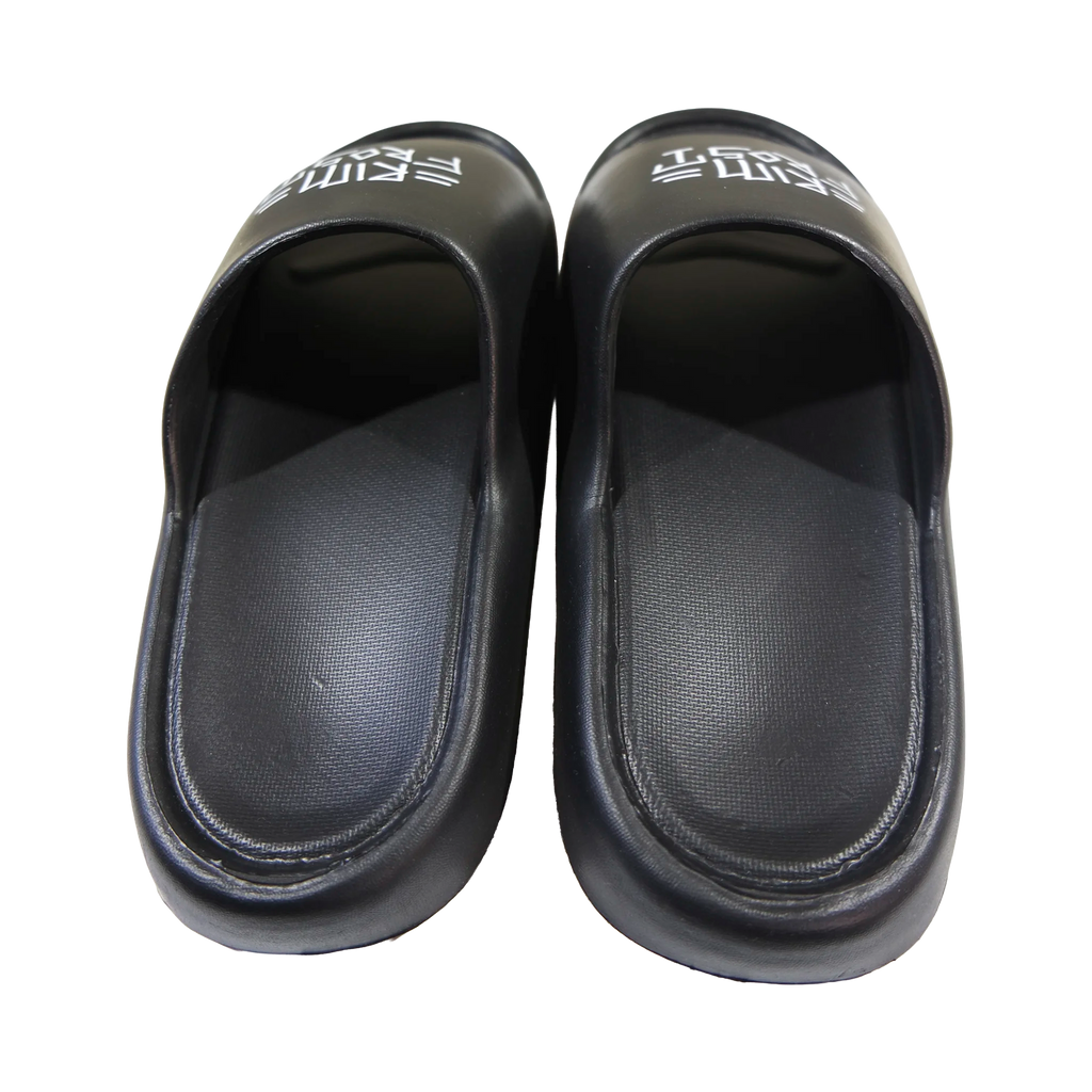 Pair of black slides with brand logo on a white background