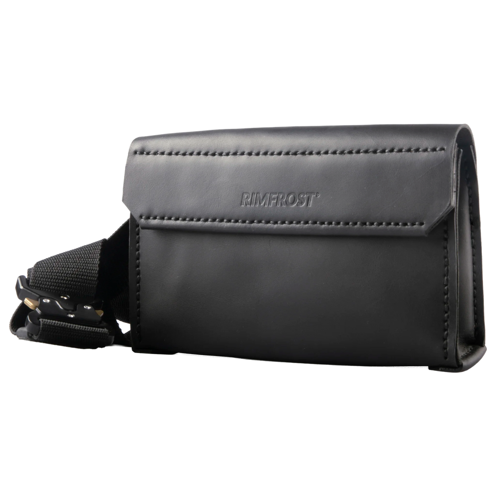 Black leather bag with a strap on a white background, featuring the brand 'Rimfrost'.