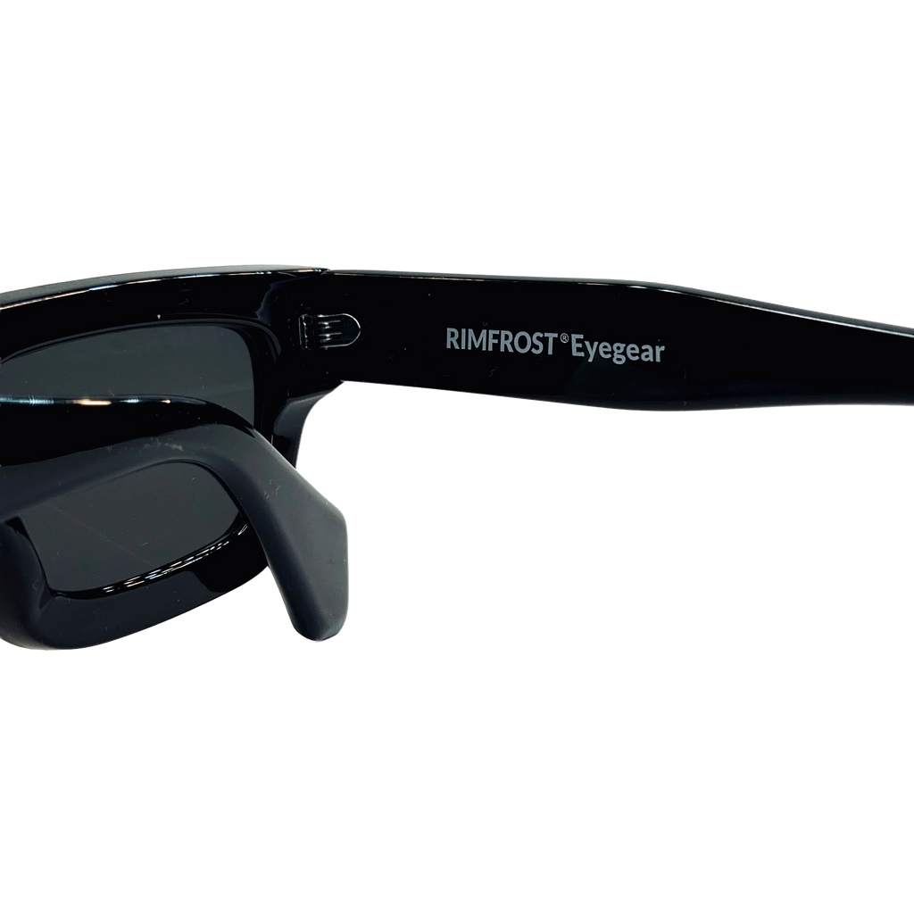 Black sunglasses with 'Rimfrost Eyegear' branding on a white background